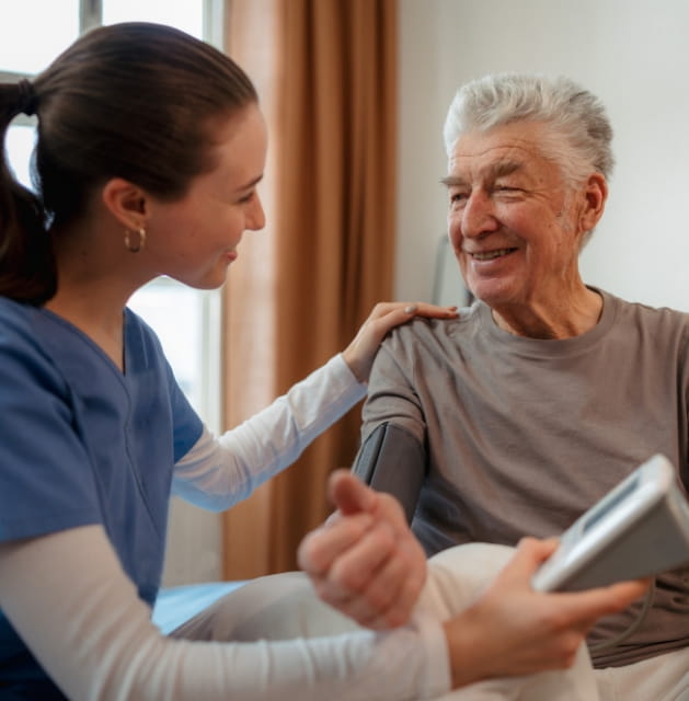 ComForCare Employee Taking Vitals