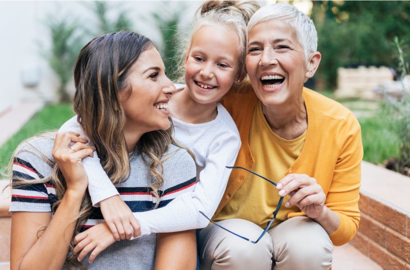 3 generations laughing together