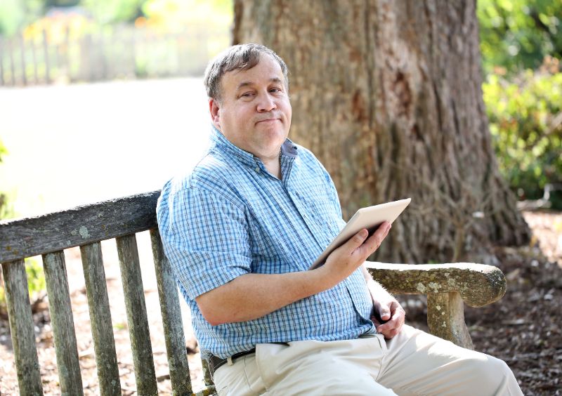 Autistic adult reading in part