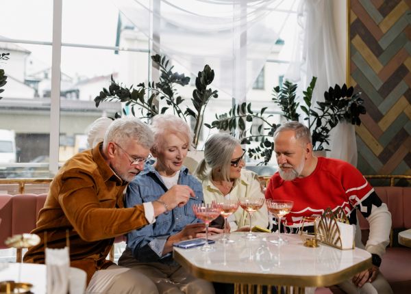 seniors socializing with drinks