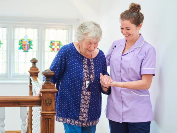 caregiver and women walking