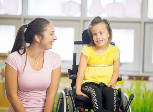 women with child in wheelchair