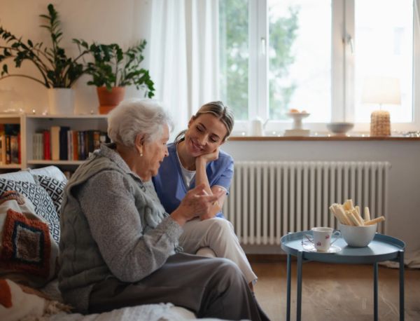 Caregiver talking with senior