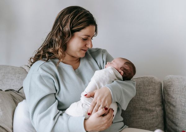 women with newborn baby