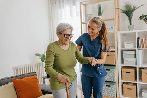 ComForCare personal assistance caregiver with client at home in San Diego