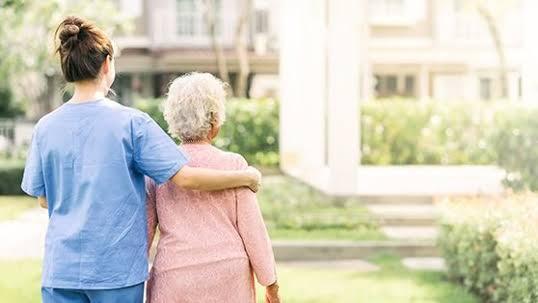 ComForCare SDRC caregiver with family in Central San Diego