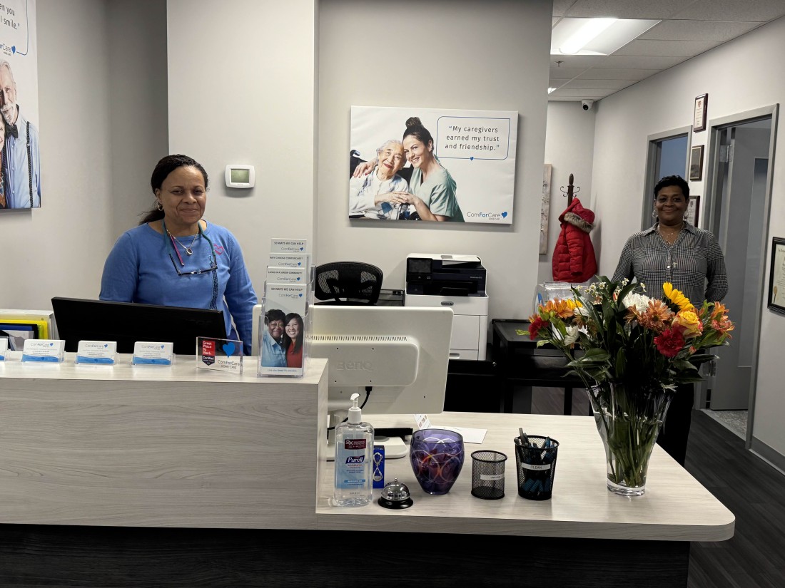 Visit With Us Through Photos - Baltimore County/Towson, MD | ComForCare - Denise_and_Renee_at_front_desk