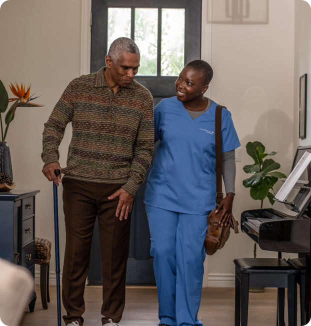 Senior client arriving home with caregiver in Lakewood Dallas — personalized home care services that support independence and safety.